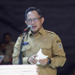 Menteri Dalam Negeri Tito Karnavian menyampaikan laporan pada Rakornas Pusat Daerah 2026 di Bogor