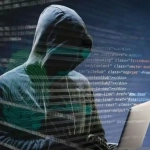Ilustrasi hacker dengan laptop terkait Korut bantah tuduhan serangan siber AS